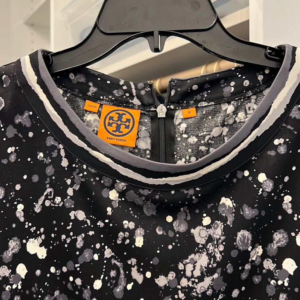 COPY - It’s Tory Burch!  Still has the plastic on the zipper!